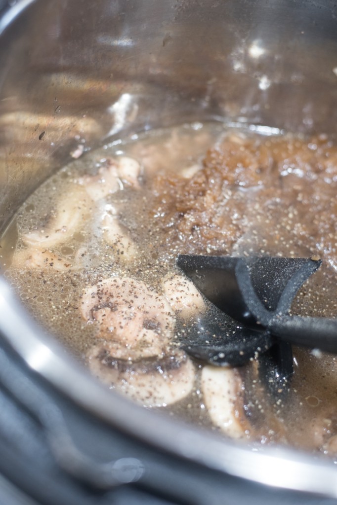 adding broth to instant pot
