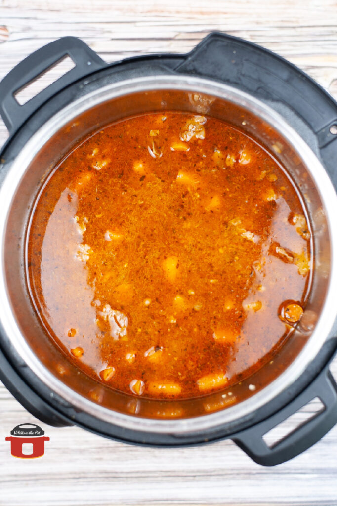 ingredients for beef stew cooking in the instant pot