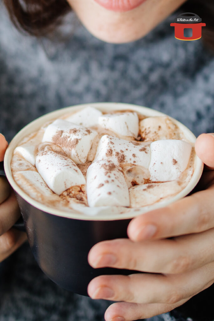 holding tuxedo hot chocolate